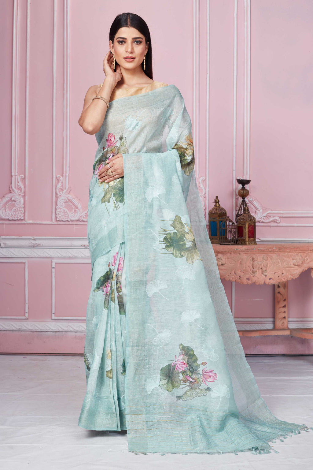 Shop stunning mint green floral print Banarasi saree online in USA. Look your best on festive occasions in latest designer sarees, pure silk saris, Kanchipuram silk sarees, handwoven sarees, tussar silk saris, embroidered sarees from Pure Elegance Indian fashion store in USA.-full view