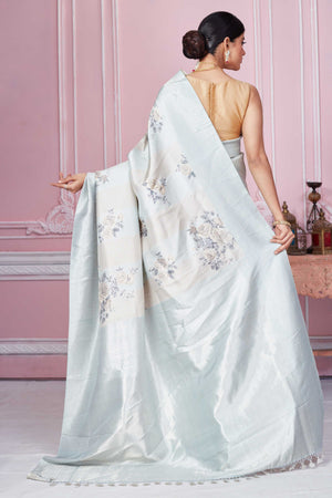 Shop powder blue floral Banarasi saree online in USA with zari border. Look your best on festive occasions in latest designer sarees, pure silk saris, Kanchipuram silk sarees, handwoven sarees, tussar silk saris, embroidered sarees from Pure Elegance Indian fashion store in USA.-back