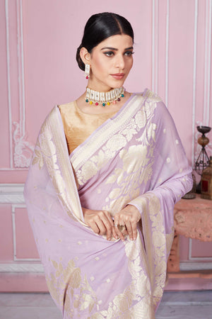 Shop lilac Banarasi sari online in USA with floral zari work. Look your best on festive occasions in latest designer sarees, pure silk saris, Kanchipuram silk sarees, handwoven sarees, tussar silk saris, embroidered sarees from Pure Elegance Indian fashion store in USA.-closeup
