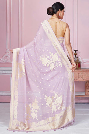 Shop lilac Banarasi sari online in USA with floral zari work. Look your best on festive occasions in latest designer sarees, pure silk saris, Kanchipuram silk sarees, handwoven sarees, tussar silk saris, embroidered sarees from Pure Elegance Indian fashion store in USA.-back