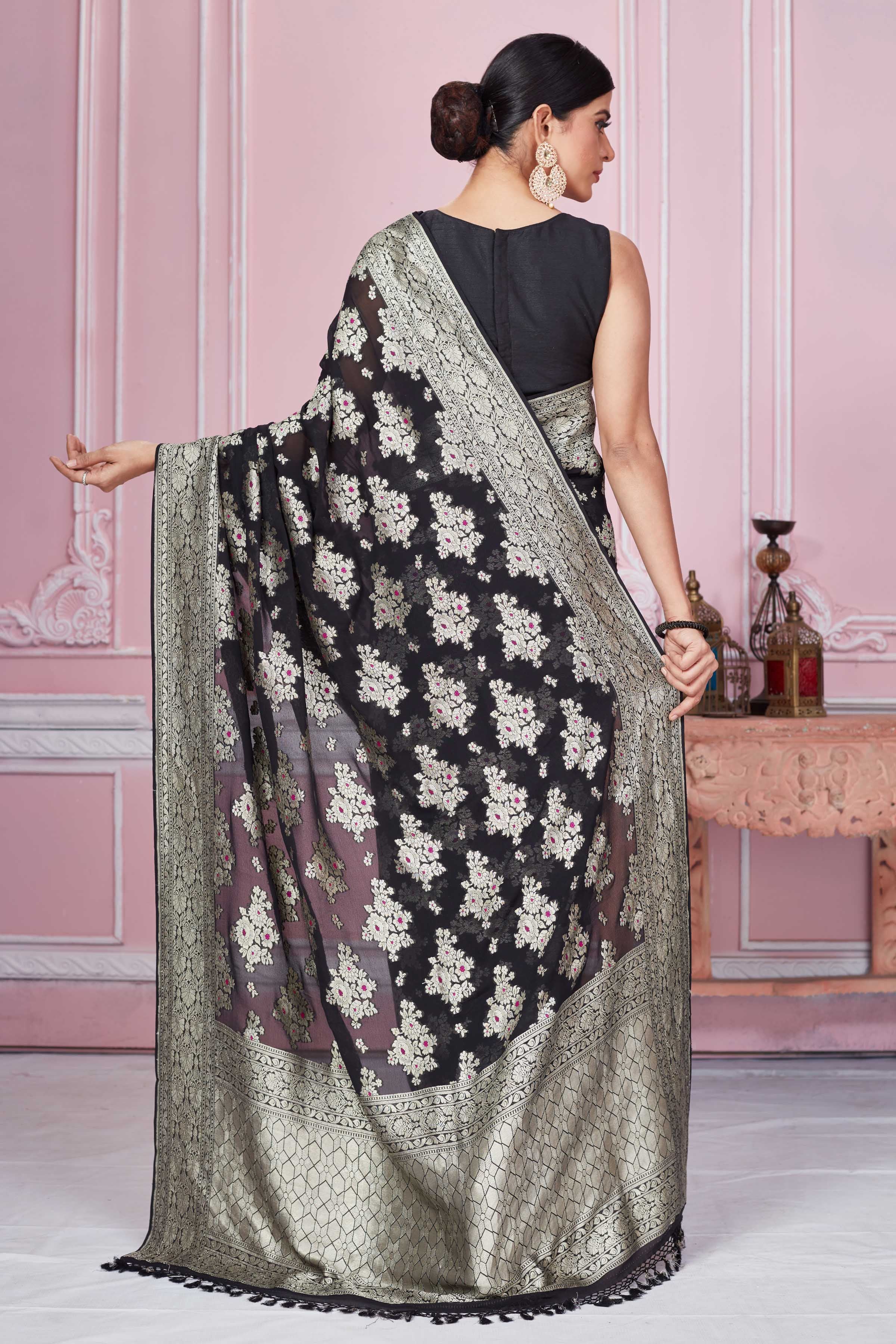 Shop black Banarasi sari online in USA with floral zari minakari motifs. Look your best on festive occasions in latest designer sarees, pure silk saris, Kanchipuram silk sarees, handwoven sarees, tussar silk saris, embroidered sarees from Pure Elegance Indian fashion store in USA.-back