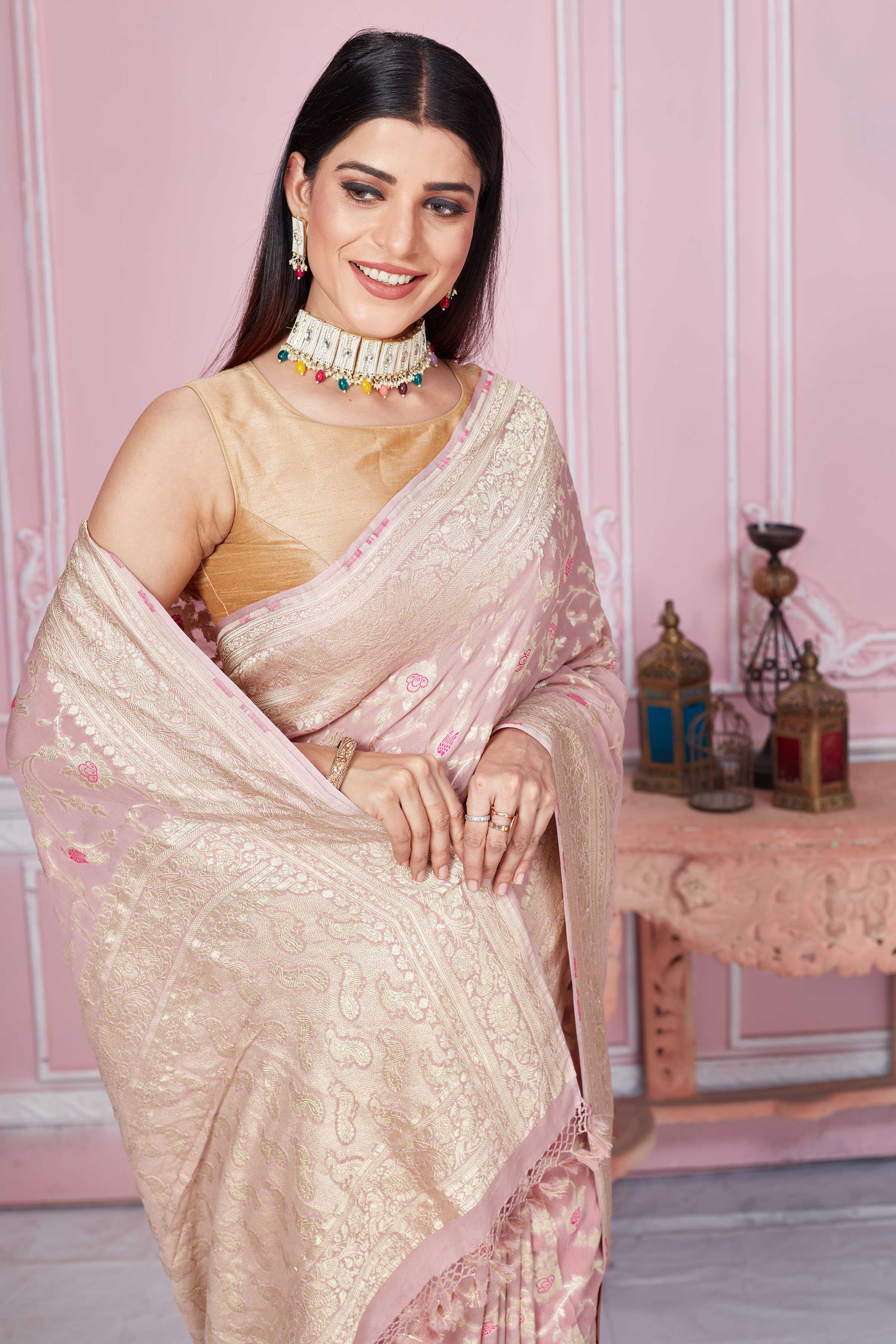 Shop dusty pink minakari zari jaal Banarasi sari online in USA. Look your best on festive occasions in latest designer sarees, pure silk saris, Kanchipuram silk sarees, handwoven sarees, tussar silk saris, embroidered sarees from Pure Elegance Indian fashion store in USA.-closeup