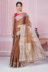 Shop brown chanderi silk sari online in USA with silver zari border. Look your best on festive occasions in latest designer sarees, pure silk saris, Kanchipuram silk sarees, handwoven sarees, tussar silk saris, embroidered sarees from Pure Elegance Indian fashion store in USA.-full view