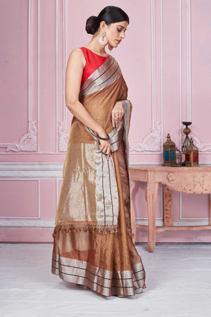 Shop brown chanderi silk sari online in USA with silver zari border. Look your best on festive occasions in latest designer sarees, pure silk saris, Kanchipuram silk sarees, handwoven sarees, tussar silk saris, embroidered sarees from Pure Elegance Indian fashion store in USA.-side