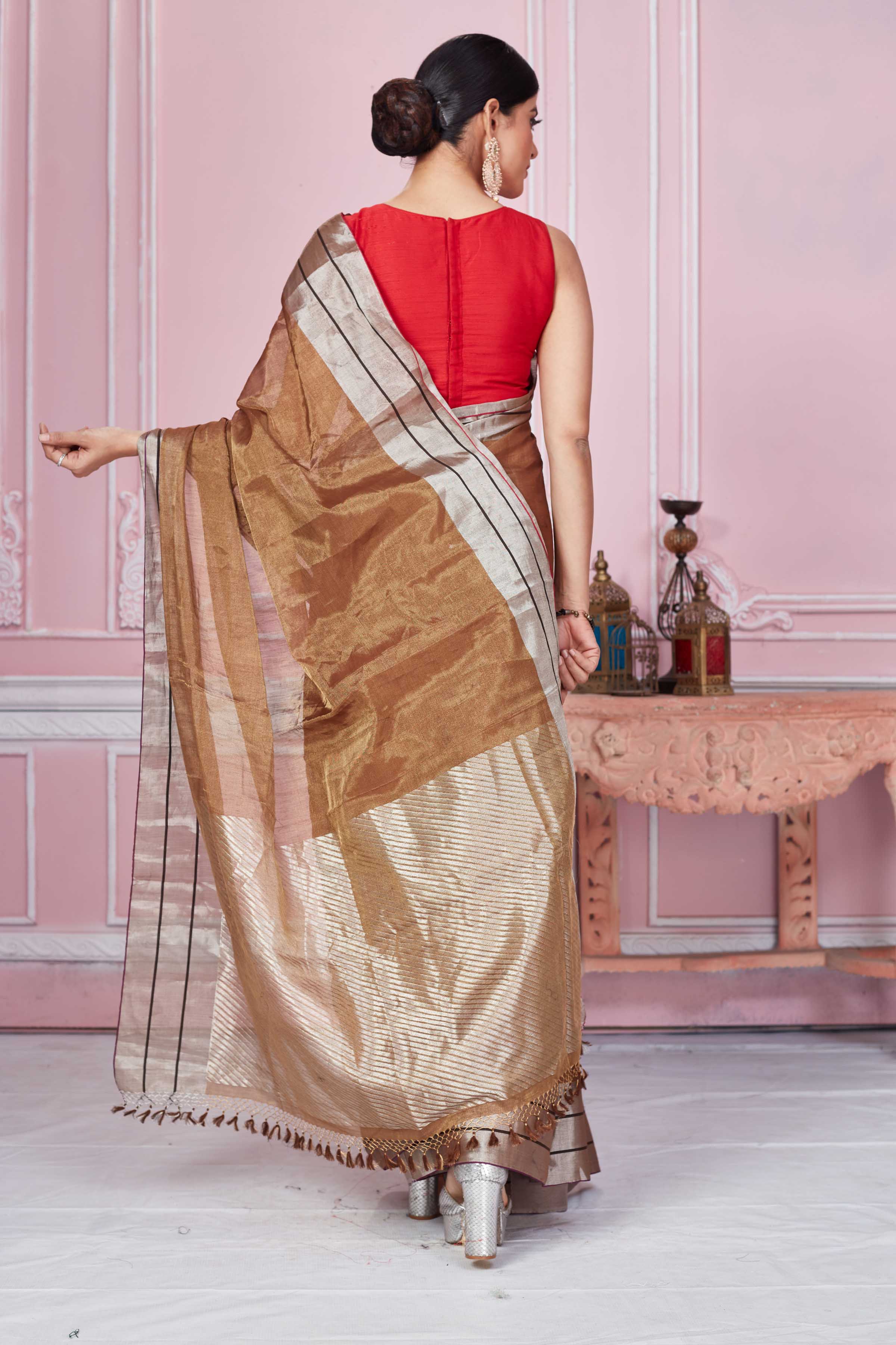 Shop brown chanderi silk sari online in USA with silver zari border. Look your best on festive occasions in latest designer sarees, pure silk saris, Kanchipuram silk sarees, handwoven sarees, tussar silk saris, embroidered sarees from Pure Elegance Indian fashion store in USA.-back
