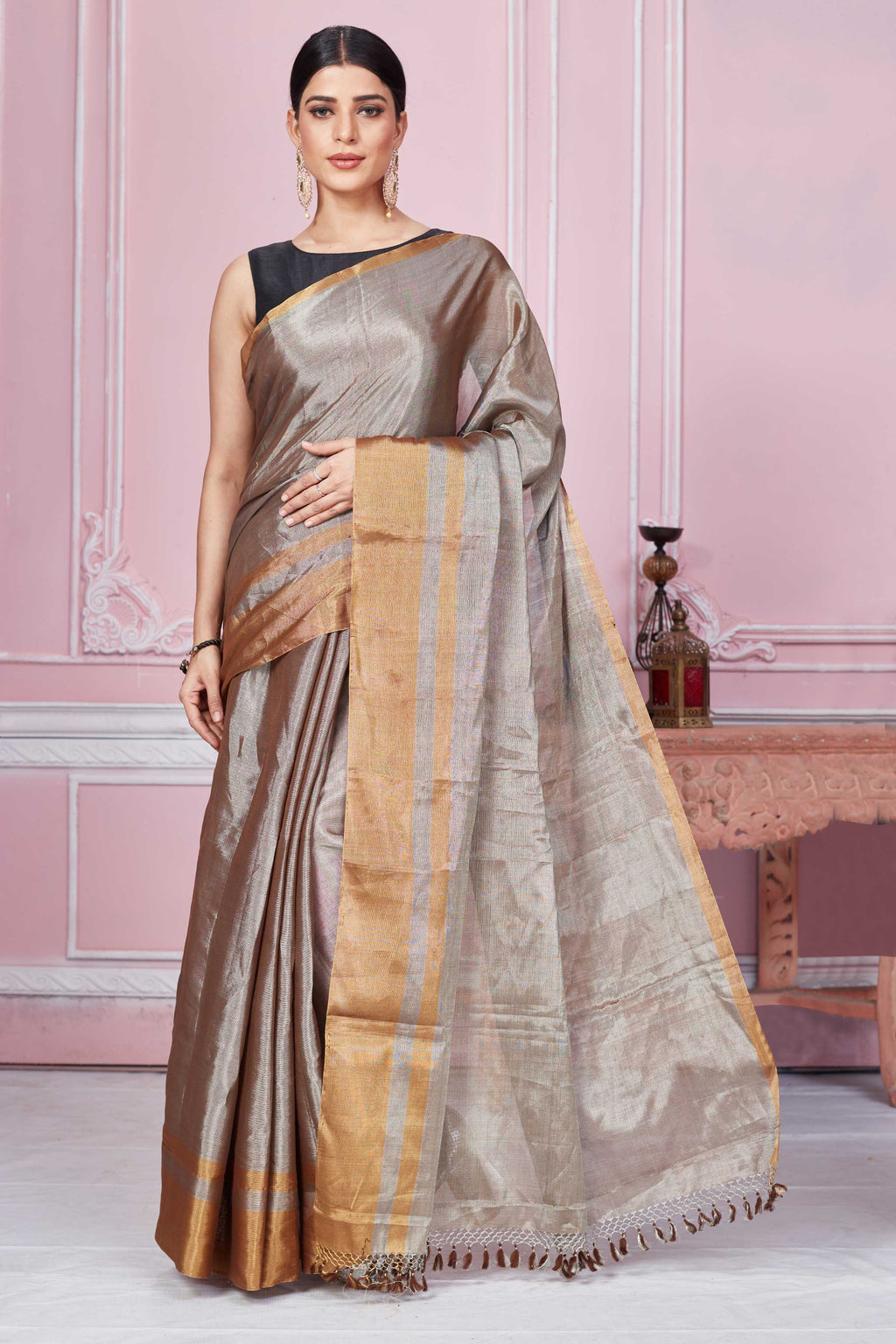Buy metallic grey tissue Banarasi sari online in USA with golden border. Look your best on festive occasions in latest designer sarees, pure silk saris, Kanchipuram silk sarees, handwoven sarees, tussar silk saris, embroidered sarees from Pure Elegance Indian fashion store in USA.-full view