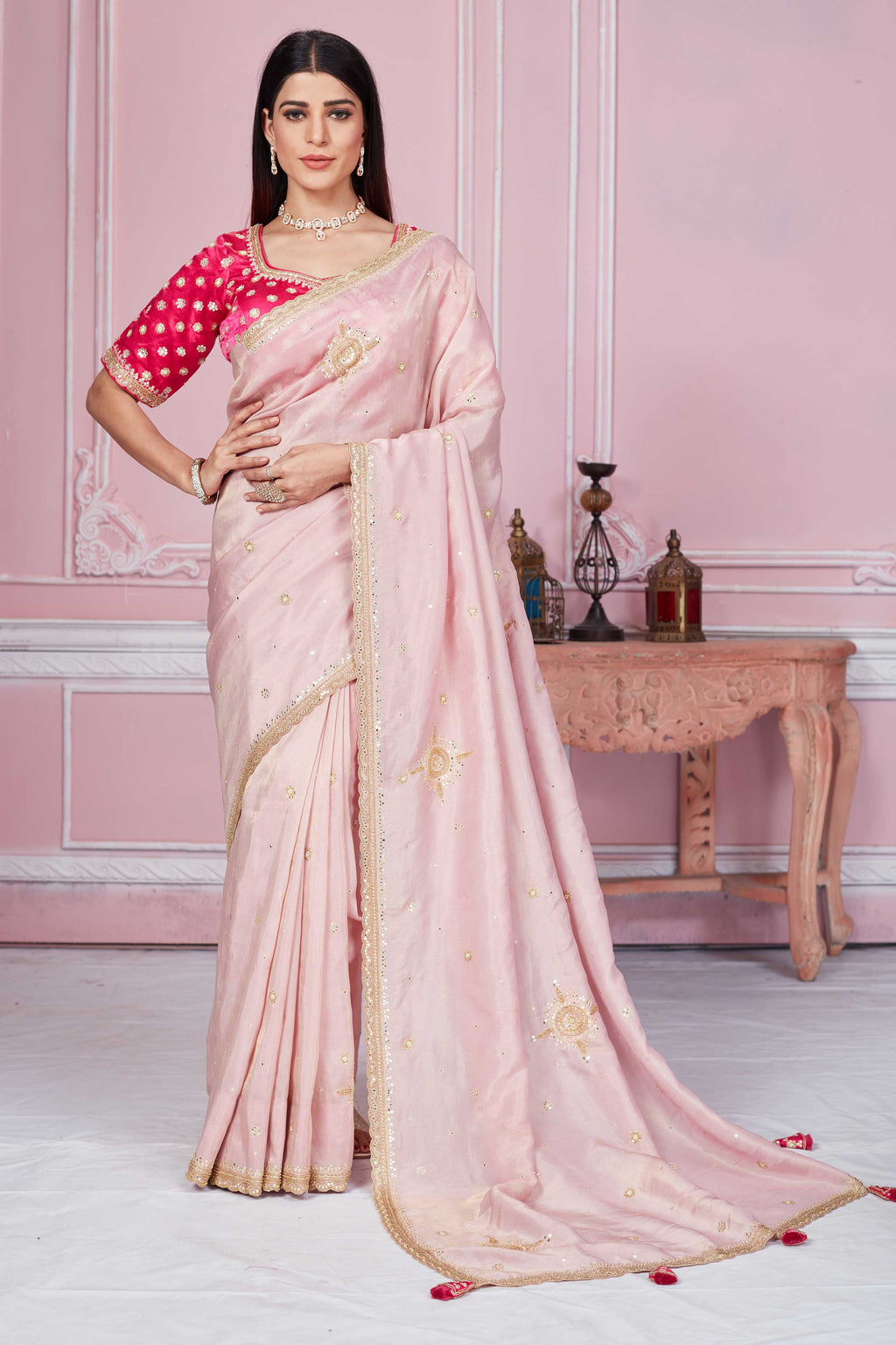 Buy powder pink embroidered tissue silk sari online in USA with pink blouse. Look your best on festive occasions in latest designer sarees, pure silk sarees, Kanjivaram silk saris, handwoven saris, tussar silk sarees, embroidered saris from Pure Elegance Indian clothing store in USA.-full view