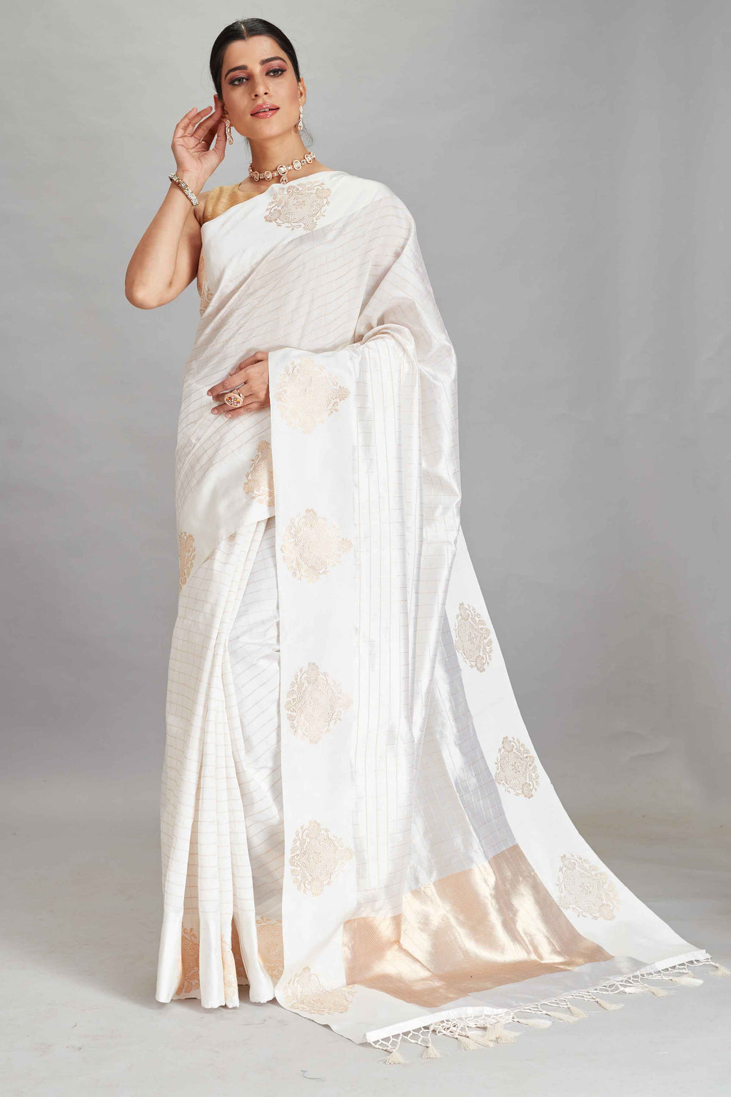Buy white check silk Banarasi saree online in USA with zari motifs border. Look your best on festive occasions in latest designer sarees, pure silk sarees, Kanjivaram silk saris, handwoven saris, tussar silk sarees, embroidered saris from Pure Elegance Indian clothing store in USA.-full view