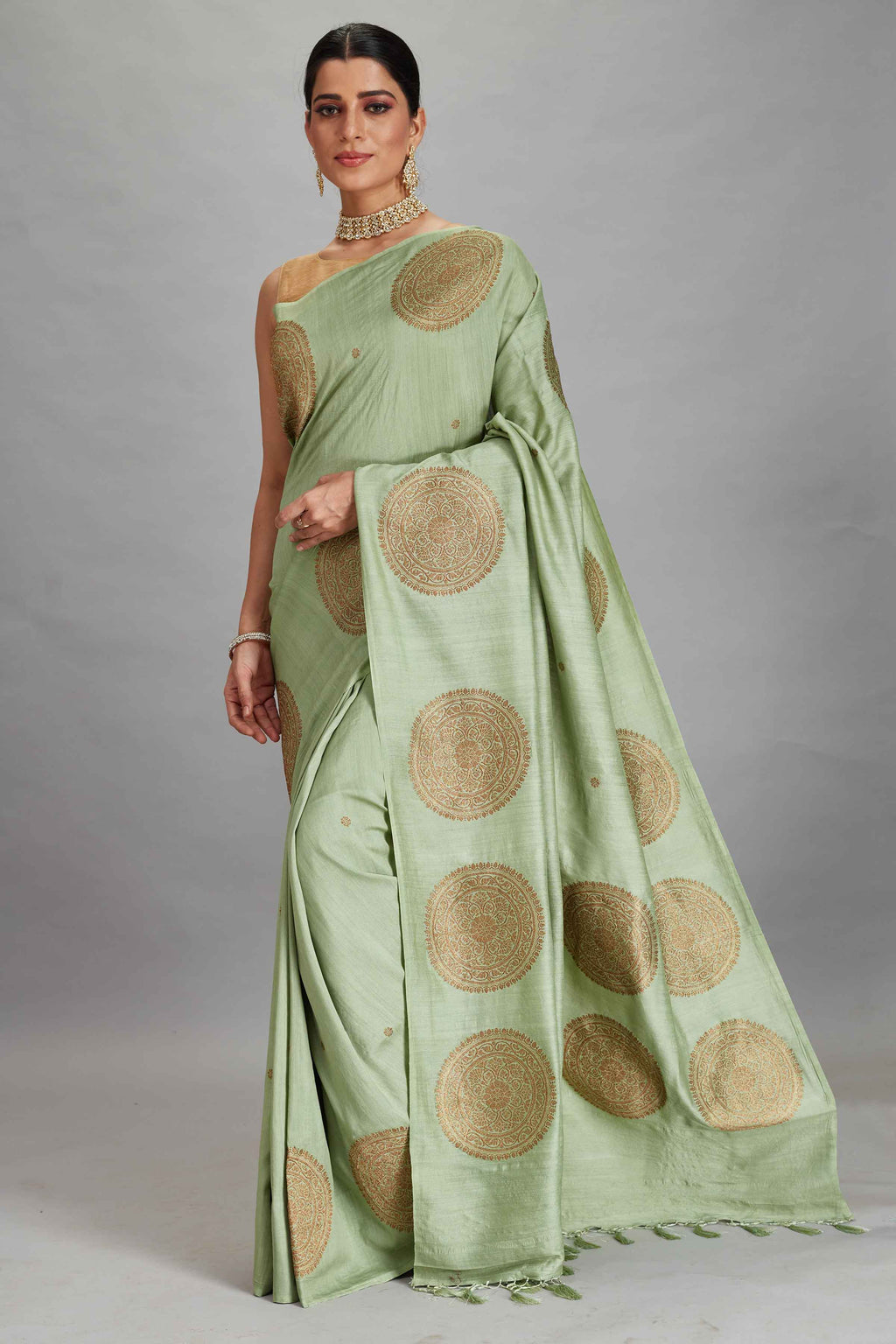 Buy sage green Muga silk Banarasi sari online in USA with big zari motifs. Look your best on festive occasions in latest designer sarees, pure silk sarees, Kanjivaram silk saris, handwoven saris, tussar silk sarees, embroidered saris from Pure Elegance Indian clothing store in USA.-full view