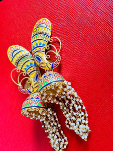 Buy Amrapali multicolor enamel jhumka earrings in USA with pearl tassels. Buy beautiful gold plated jewelry, gold plated earrings, silver earrings, silver bangles, bridal jewelry, wedding jewellery from Pure Elegance Indian fashion store in USA.-full view