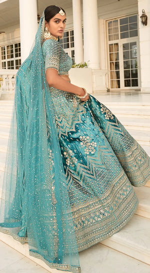 Shop sea green embroidered designer lehenga with dupatta online in USA. Radiate elegance and class in designer lehengas, designer sarees, embroidered lehenga, bridal lehenga from Pure Elegance Indian fashion store in USA.-side