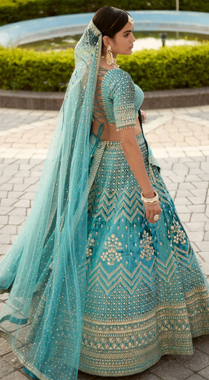 Shop sea green embroidered designer lehenga with dupatta online in USA. Radiate elegance and class in designer lehengas, designer sarees, embroidered lehenga, bridal lehenga from Pure Elegance Indian fashion store in USA.-back