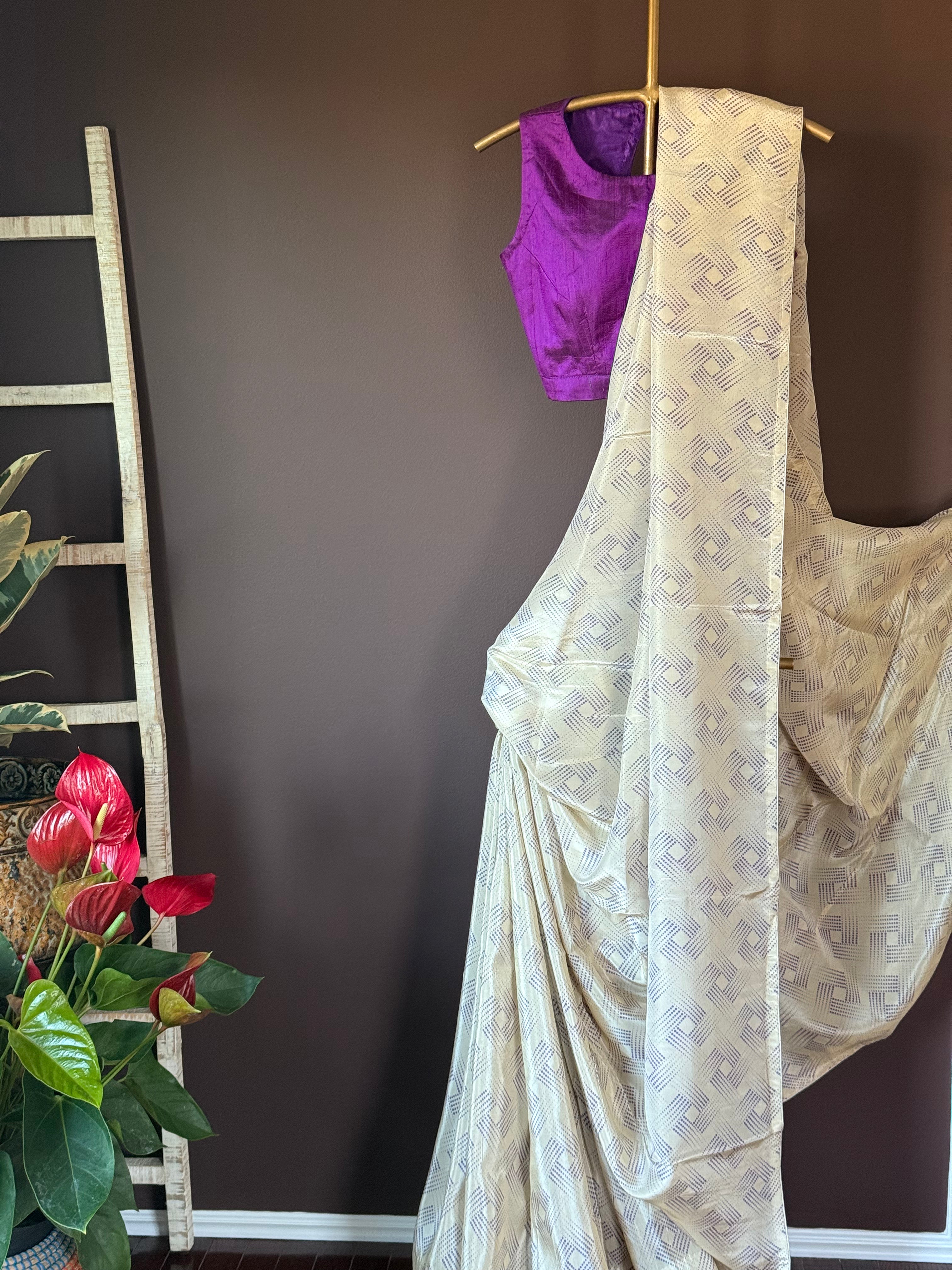 92A918 Cream Crepe Printed Saree With Purple Blouse