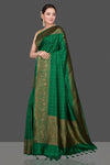 Shop stunning green check tussar Banarasi saree online in USA with antique zari border. Go for stunning Indian designer sarees, georgette sarees, handwoven saris, embroidered sarees for festive occasions and weddings from Pure Elegance Indian clothing store in USA.-full view
