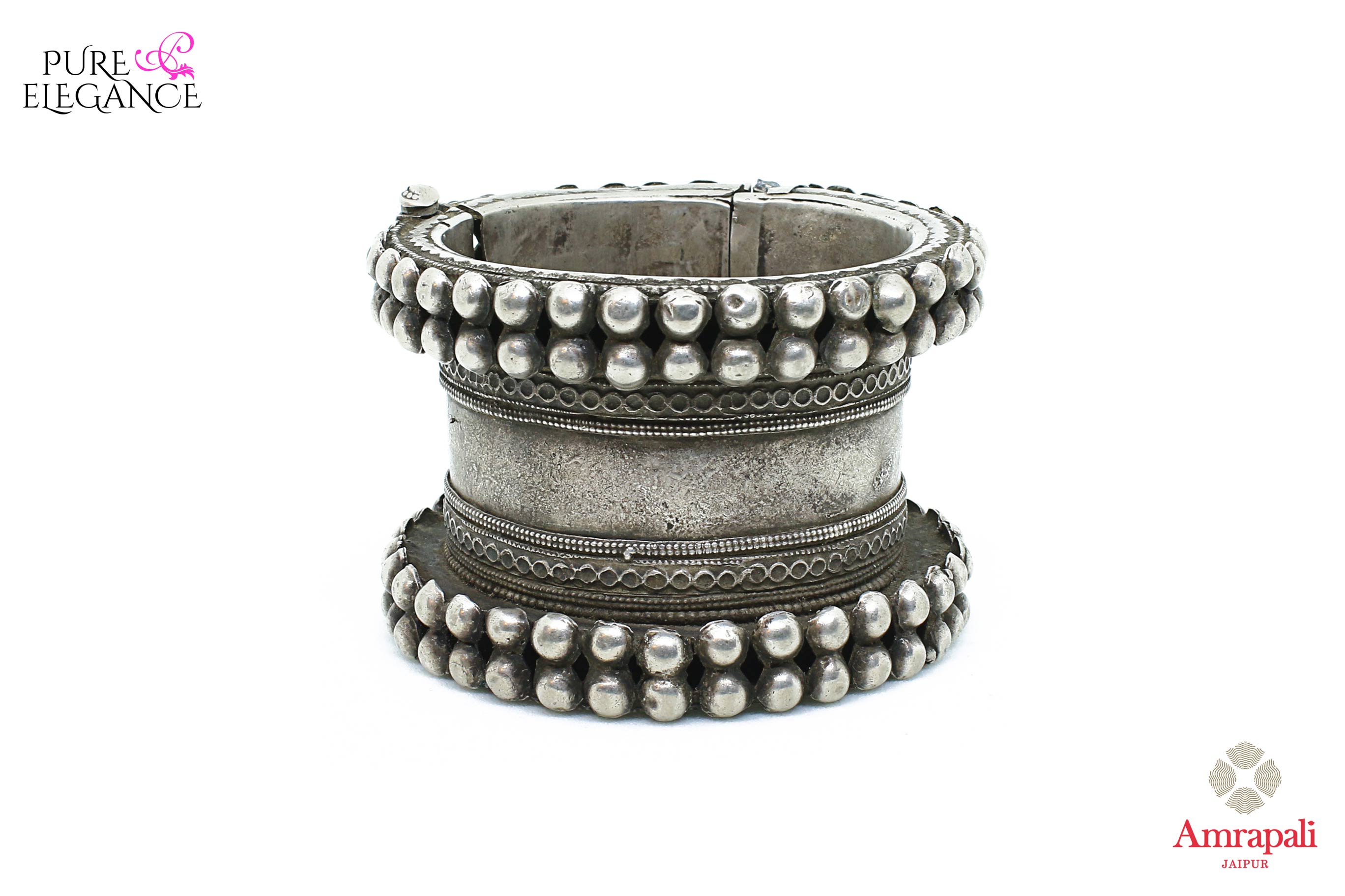 Buy beautiful Amrapali handcrafted heavy silver bangle online in USA. Find an exquisite collection of handcrafted silver gold plated jewelry in USA at Pure Elegance Indian fashion store. Complete your festive look with traditional Indian jewelry, silver gold plated earrings, silver jewellery from our online store.-front