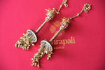 Shop delicate silver gold plated Amrapali jhumki earrings with tassels online in USA from Pure Elegance. Complete your traditional look with an exquisite collection of Indian silver gold plated jewelry, wedding jewellery, silver gold plated earrings and much more from our Indian fashion store in USA.  -flatlay