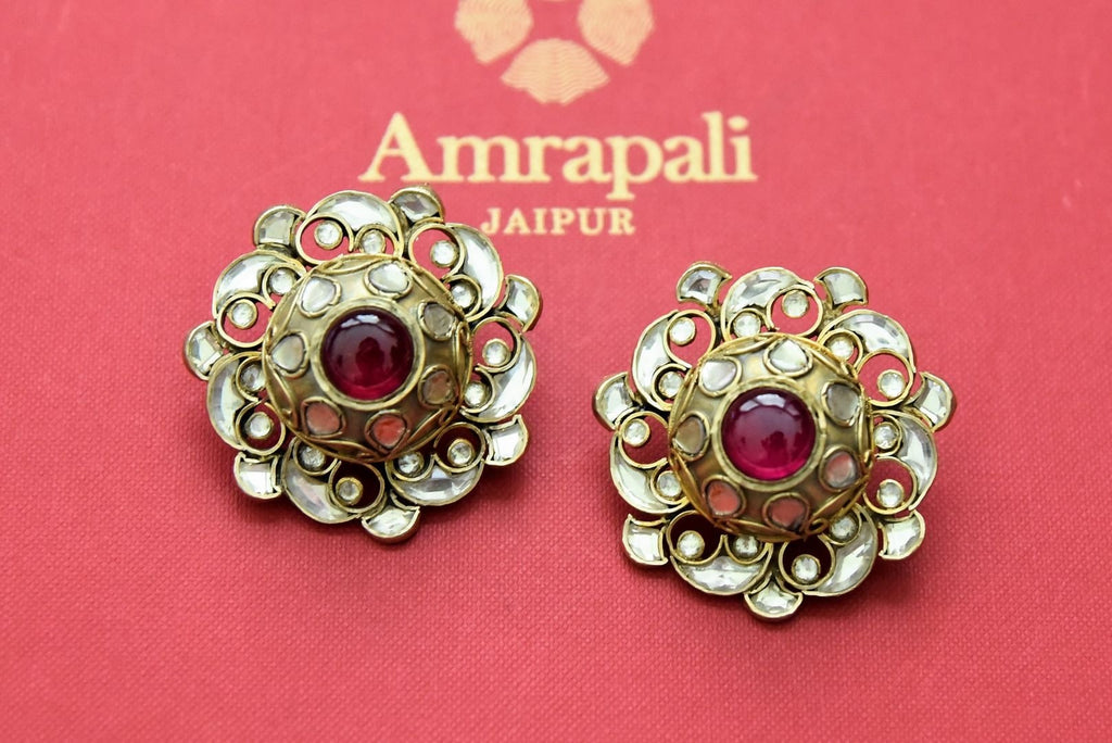 Buy stunning Amrapali gold plated kundan studs online in USA with red stone. Be the center of attraction at weddings and festive occasions in the exquisite Indian jewelry, golden plated jewellery, gold plated earrings, silver jewelry, silver earrings from Pure Elegance India fashion store in USA.-full view