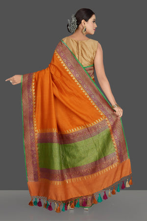Buy beautiful mustard color muga Banarasi sari online in USA with antique zari purple border. Keep it elegant with Muga silk sarees, Banarasi silk sarees, handwoven sarees from Pure Elegance Indian fashion boutique in USA. We bring a especially curated collection of ethnic sarees for Indian women in USA under one roof!-back