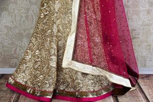 Buy Gold Net Lehenga online in USA with pink blouse and dupatta from Pure Elegance. Our store brings you stylish designer Indian Lehenga choli for every occasion.-skirt