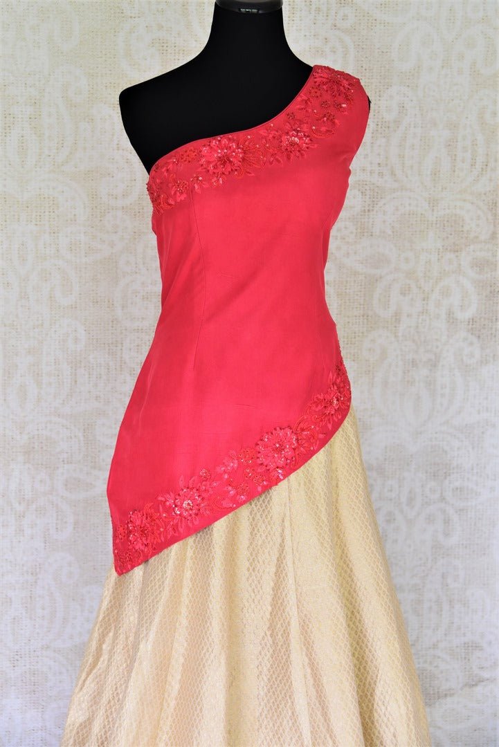 Buy online pink embroidered blouse with gold silk skirt in USA. Add style to your look with Indian designer dresses available at Pure Elegance Indian fashion store in USA or shop online.-blouse
