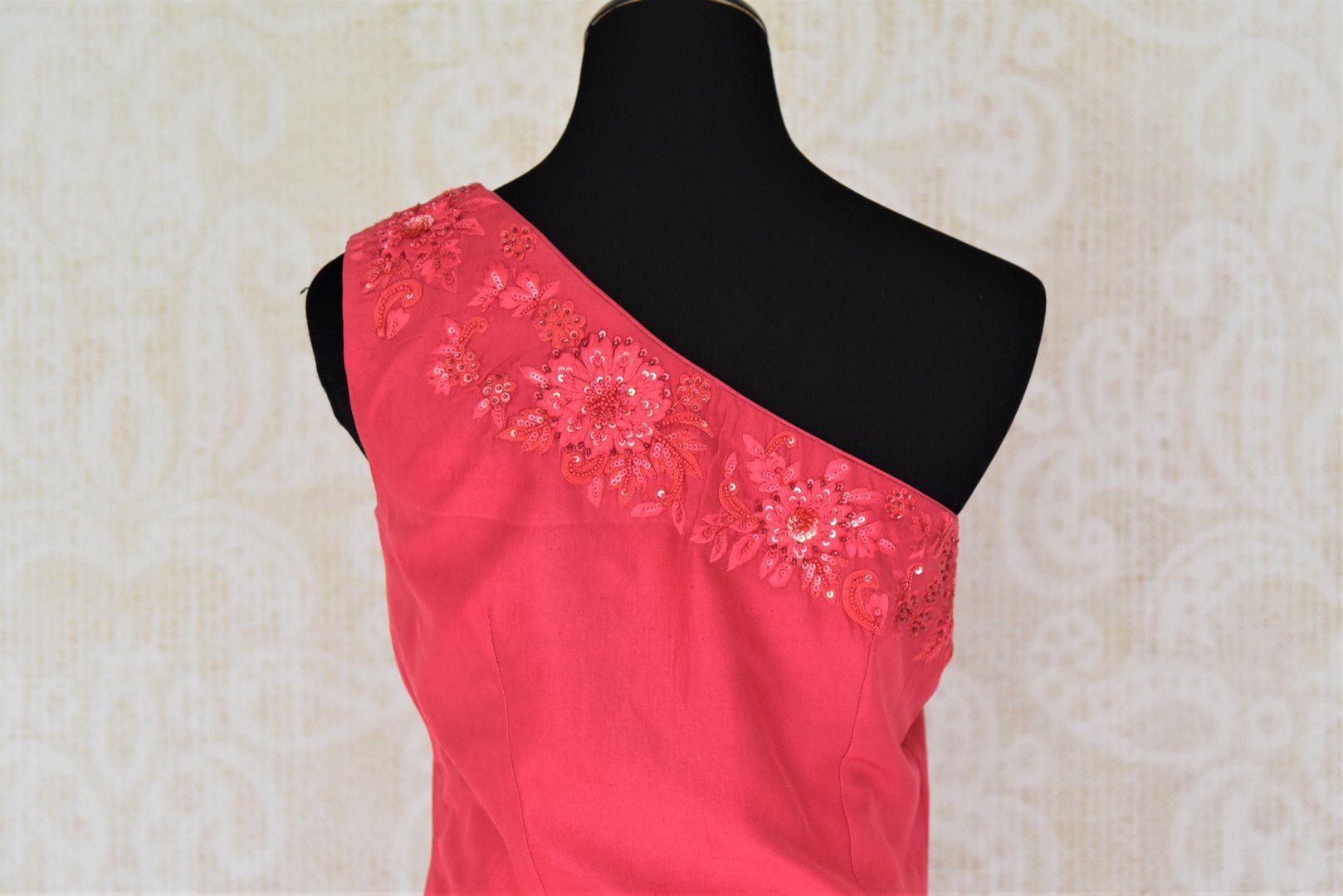 Buy online pink embroidered blouse with gold silk skirt in USA. Add style to your look with Indian designer dresses available at Pure Elegance Indian fashion store in USA or shop online.-back