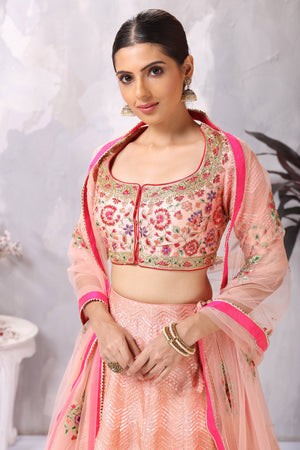 Buy stunning light pink embroidered designer lehenga online in USA. Be the center of attraction on special occasion in beautiful designer lehengas, bridal lehengas, palazzo suits, sharara suits, Anarkali suits, gowns from Pure  Elegance Indian fashion store in USA.-closeup