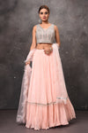 Buy stunning powder pink mirror work designer lehenga online in USA with dupatta. Get set for weddings and festive occasions in exclusive designer Anarkali suits, wedding gown, salwar suits, gharara suits, Indowestern dresses from Pure Elegance Indian fashion store in USA.-front