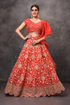 Buy beautiful red embroidered designer lehenga online in USA with fancy dupatta. Get set for weddings and festive occasions in exclusive designer Anarkali suits, wedding gown, salwar suits, gharara suits, Indowestern dresses from Pure Elegance Indian fashion store in USA.-full view