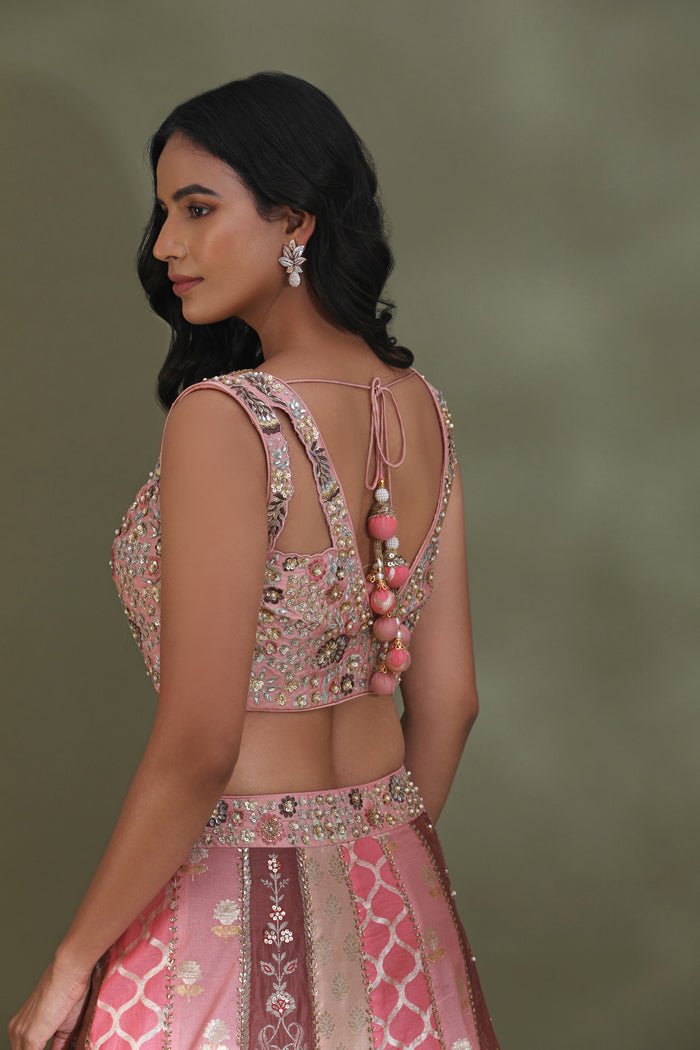 Buy beautiful pink embroidered contemporary designer lehenga online in USA with dupatta. Look your best at weddings and parties in Indian dresses, designer lehengas, Anarkali suits, designer gowns, salwar suits, sharara suits from Pure Elegance Indian fashion store in USA.-back