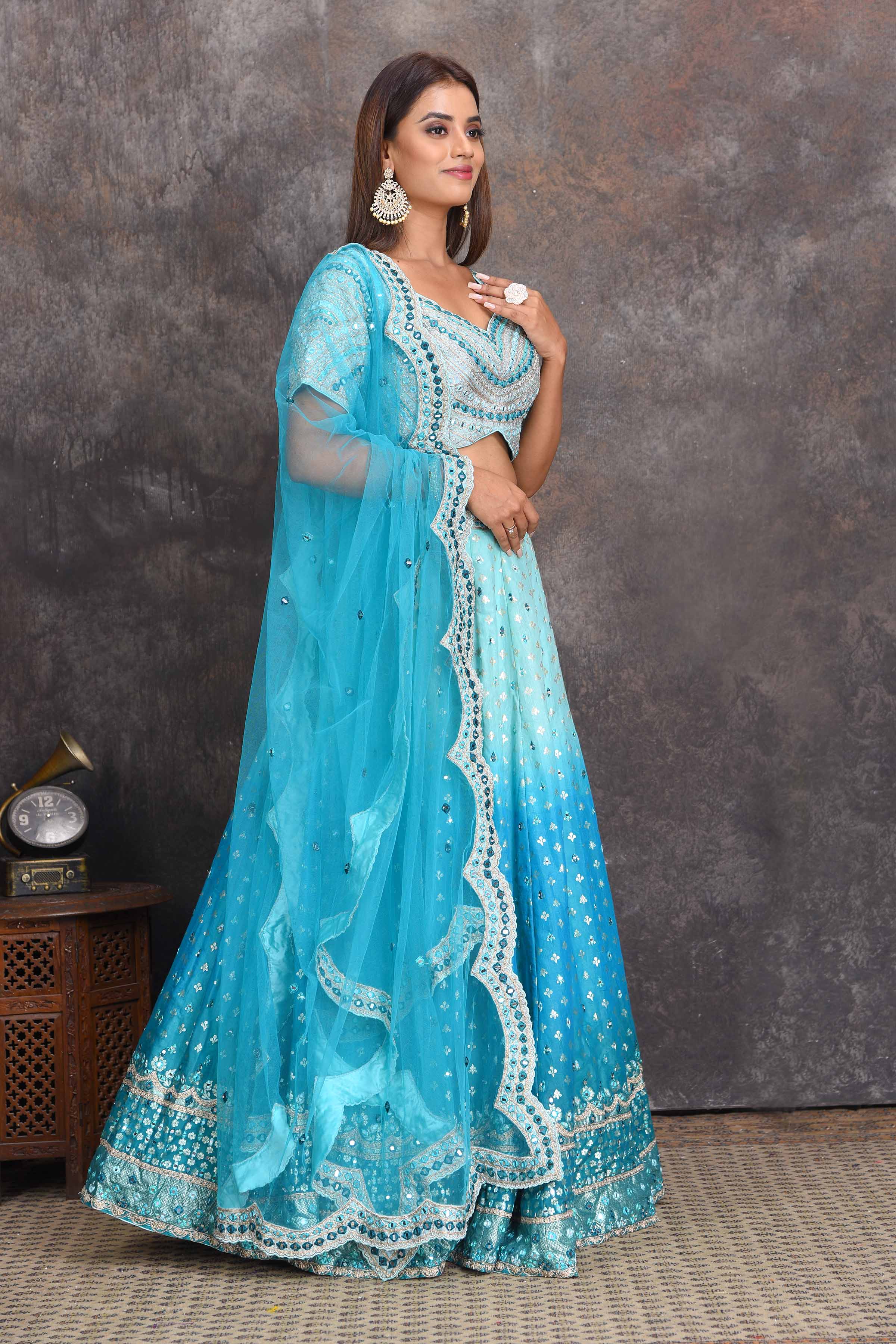 Shop ombre blue mirror work chanderi lehenga online in USA. Set a style statement on special occasions in exquisite designer lehengas, Anarkali suits, sharara suits, salwar suits, Indowestern outfits from Pure Elegance Indian fashion store in USA.-right