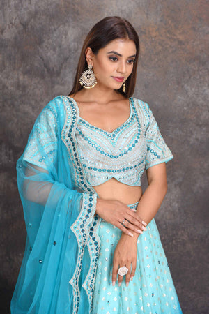 Shop ombre blue mirror work chanderi lehenga online in USA. Set a style statement on special occasions in exquisite designer lehengas, Anarkali suits, sharara suits, salwar suits, Indowestern outfits from Pure Elegance Indian fashion store in USA.-closeup