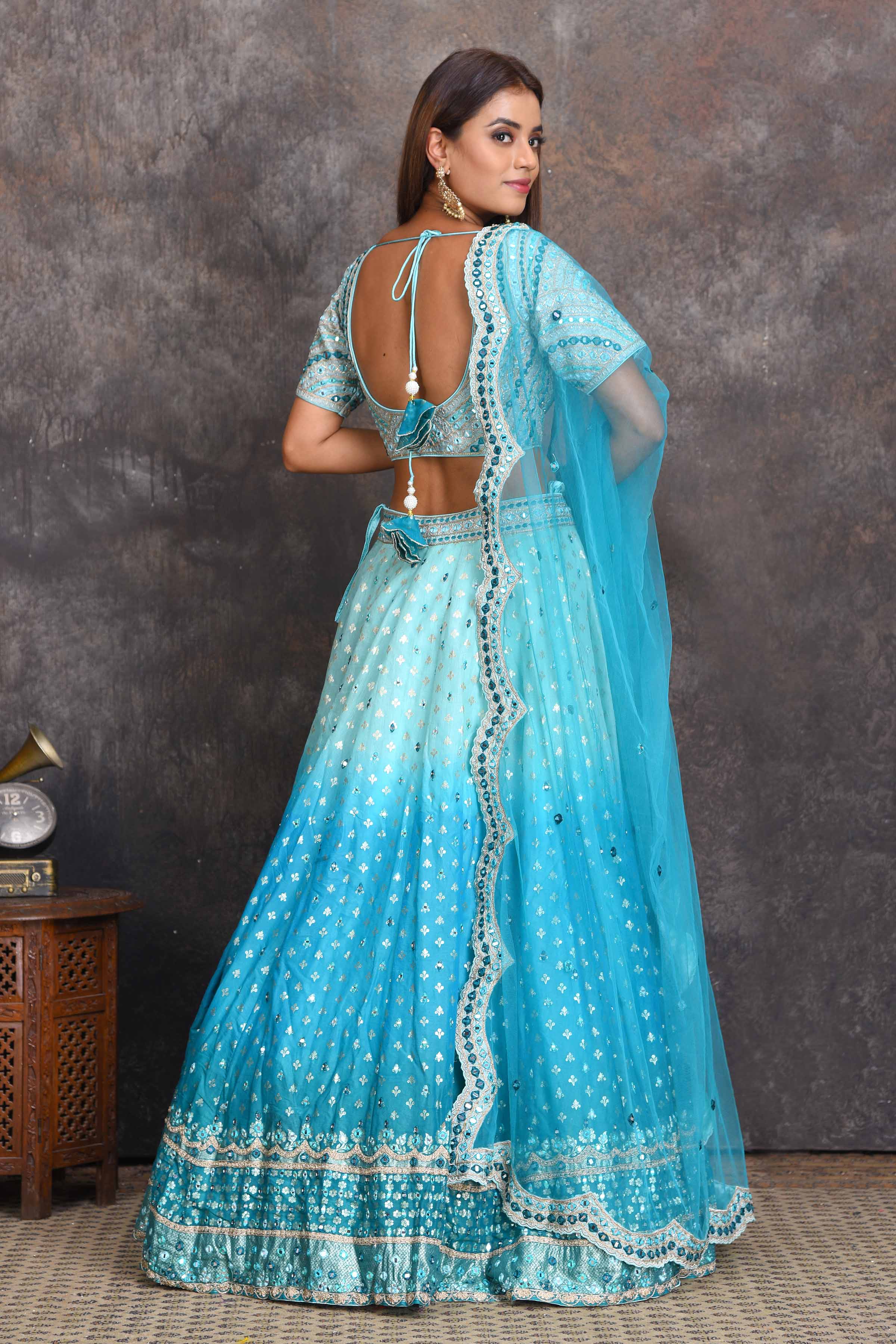 Shop ombre blue mirror work chanderi lehenga online in USA. Set a style statement on special occasions in exquisite designer lehengas, Anarkali suits, sharara suits, salwar suits, Indowestern outfits from Pure Elegance Indian fashion store in USA.-back