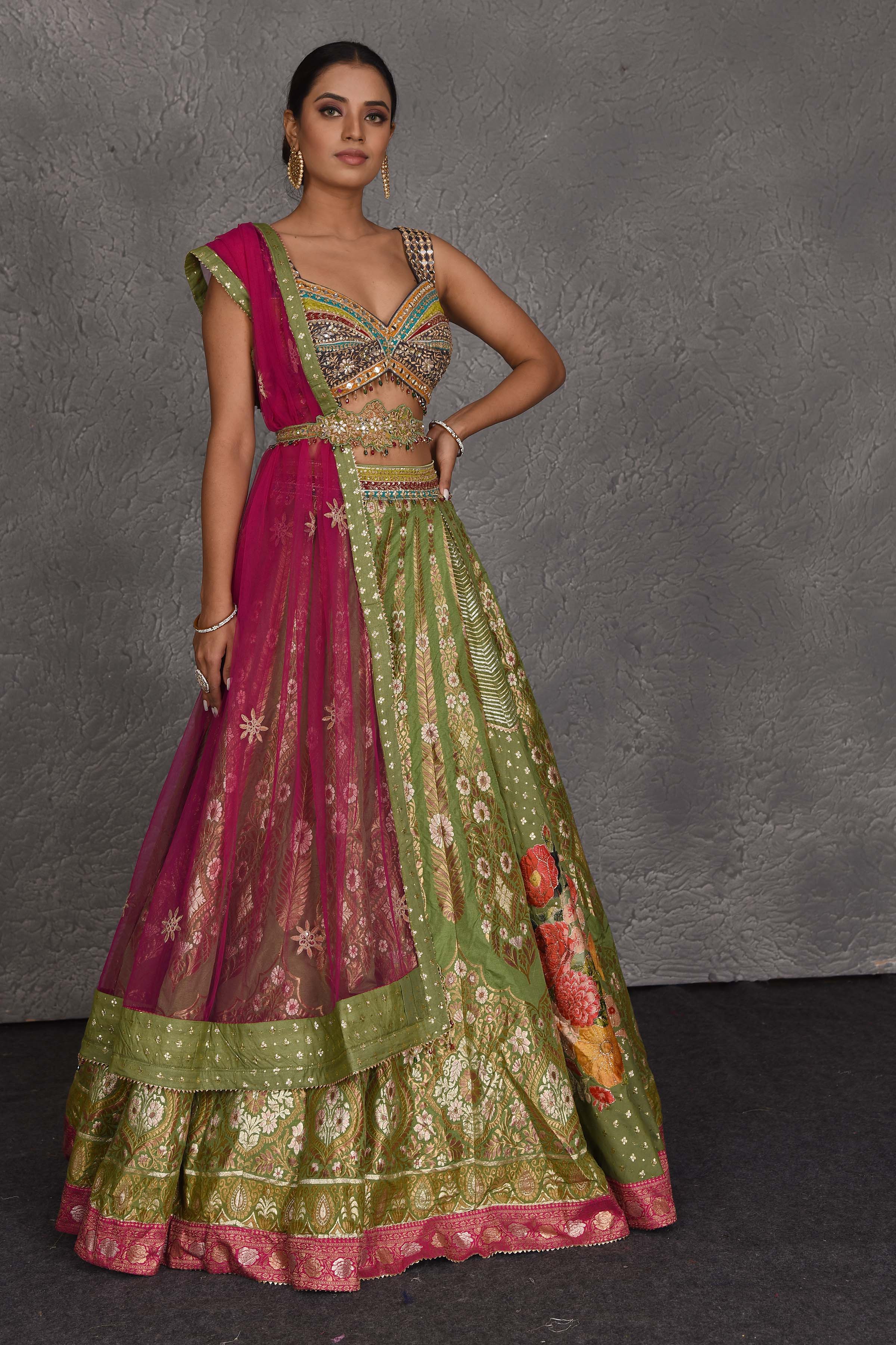 Buy beautiful pista green embroidered lehenga online in USA with pink dupatta. Flaunt your Indian style on festive occasions in stunning designer lehengas, Anarkali suit, sharara suits, designer gowns, designer sarees, embroidered sarees from Pure Elegance India fashion store in USA. -side