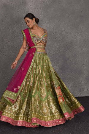 Buy beautiful pista green embroidered lehenga online in USA with pink dupatta. Flaunt your Indian style on festive occasions in stunning designer lehengas, Anarkali suit, sharara suits, designer gowns, designer sarees, embroidered sarees from Pure Elegance India fashion store in USA. -lehenga