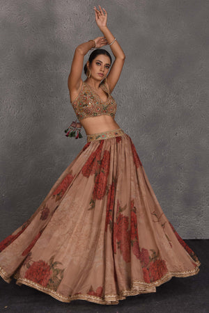 Shop beautiful brown floral printed lehenga online in USA with embroidered blouse. Flaunt your Indian style on festive occasions in stunning designer lehengas, Anarkali suit, sharara suits, designer gowns, designer sarees, embroidered sarees from Pure Elegance India fashion store in USA. -side