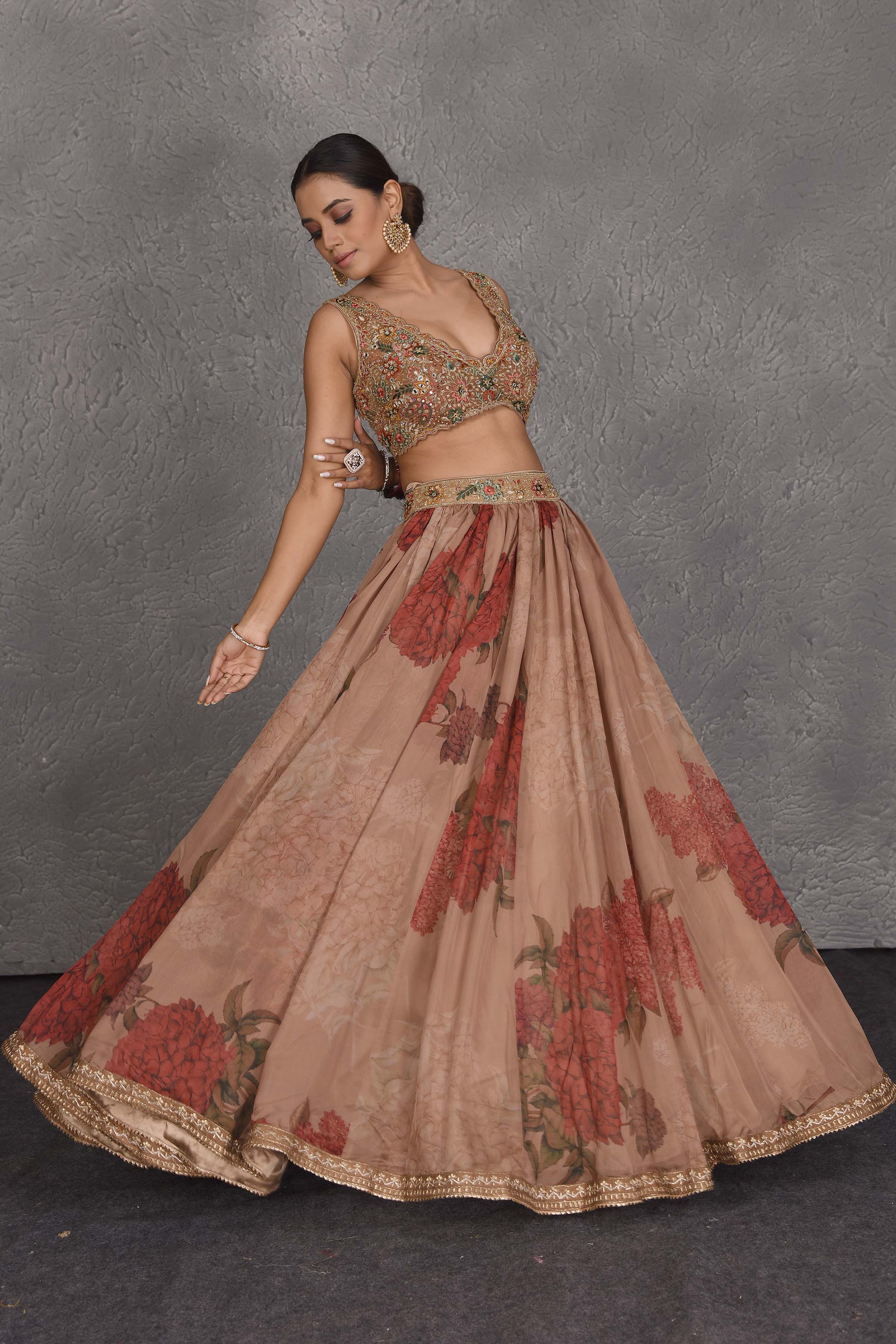 Shop beautiful brown floral printed lehenga online in USA with embroidered blouse. Flaunt your Indian style on festive occasions in stunning designer lehengas, Anarkali suit, sharara suits, designer gowns, designer sarees, embroidered sarees from Pure Elegance India fashion store in USA. -lehenga