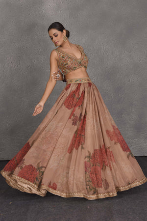 Shop beautiful brown floral printed lehenga online in USA with embroidered blouse. Flaunt your Indian style on festive occasions in stunning designer lehengas, Anarkali suit, sharara suits, designer gowns, designer sarees, embroidered sarees from Pure Elegance India fashion store in USA. -lehenga