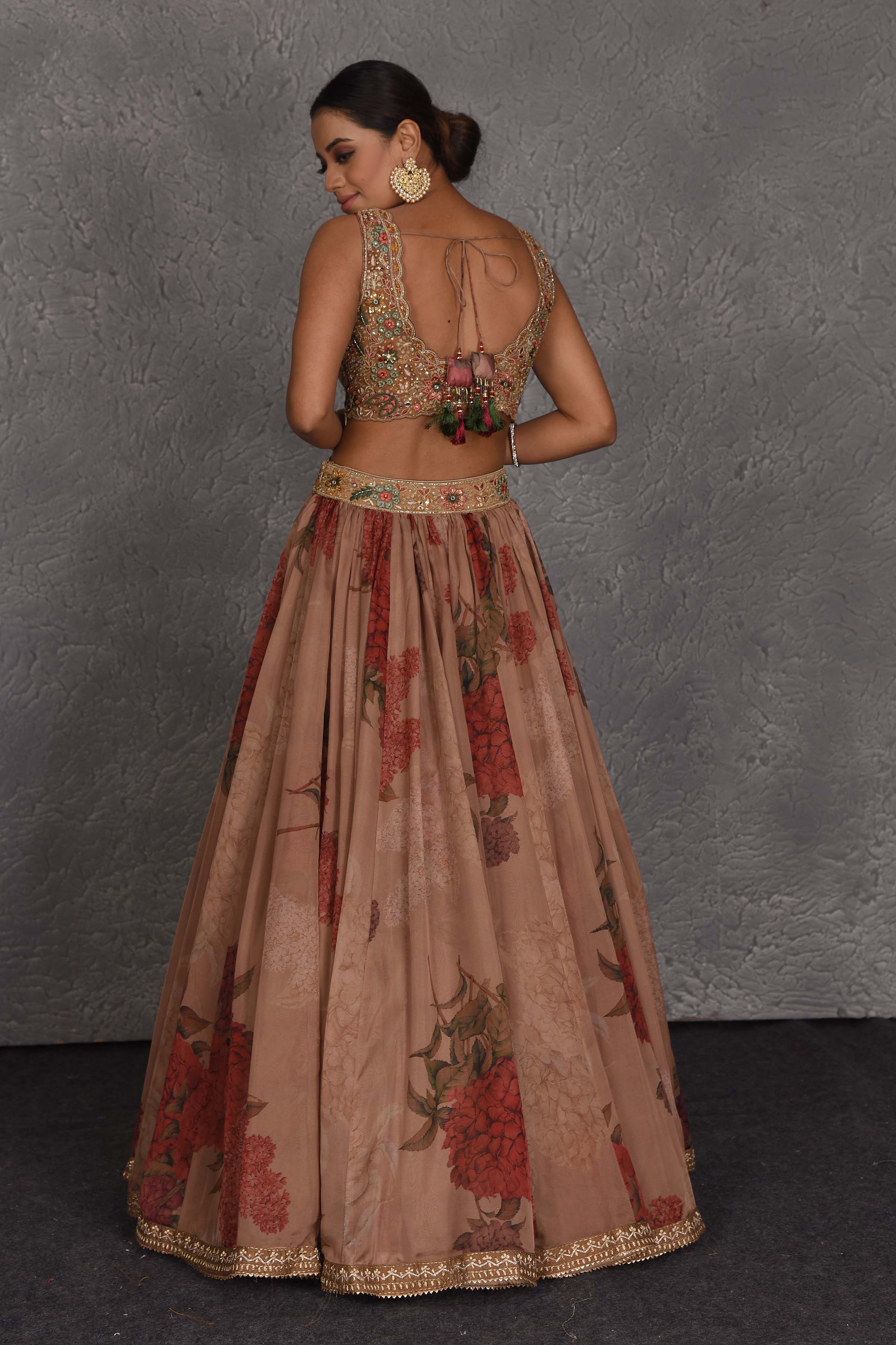 Shop beautiful brown floral printed lehenga online in USA with embroidered blouse. Flaunt your Indian style on festive occasions in stunning designer lehengas, Anarkali suit, sharara suits, designer gowns, designer sarees, embroidered sarees from Pure Elegance India fashion store in USA. -back