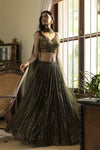 Shop beautiful moss green sequin work lehenga online in USA with dupatta. Dazzle on weddings and special occasions with exquisite Indian designer dresses, sharara suits, Anarkali suits, wedding lehengas from Pure Elegance Indian fashion store in USA.-full view