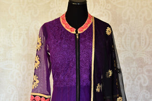 Buy purple embroidered Anarkali suit with churidaar online in USA and dupatta from Pure Elegance. Choose from a range of exclusive Indian designer suits, wedding dresses, Anarkali suits in beautiful styles and designs from our Indian fashion store in USA and flaunt your tasteful sartorial choices on special occasions.-front