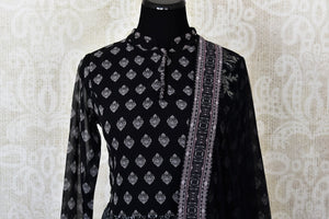 Black printed georgette Anarkali suit for online shopping in USA with dupatta. Get floored by a vibrant collection of Indian designer clothes at Pure Elegance Indian fashion store in USA. Choose from a beautiful range of Indian wedding dresses, designer lehengas and Anarkali suits for special occasions.-front