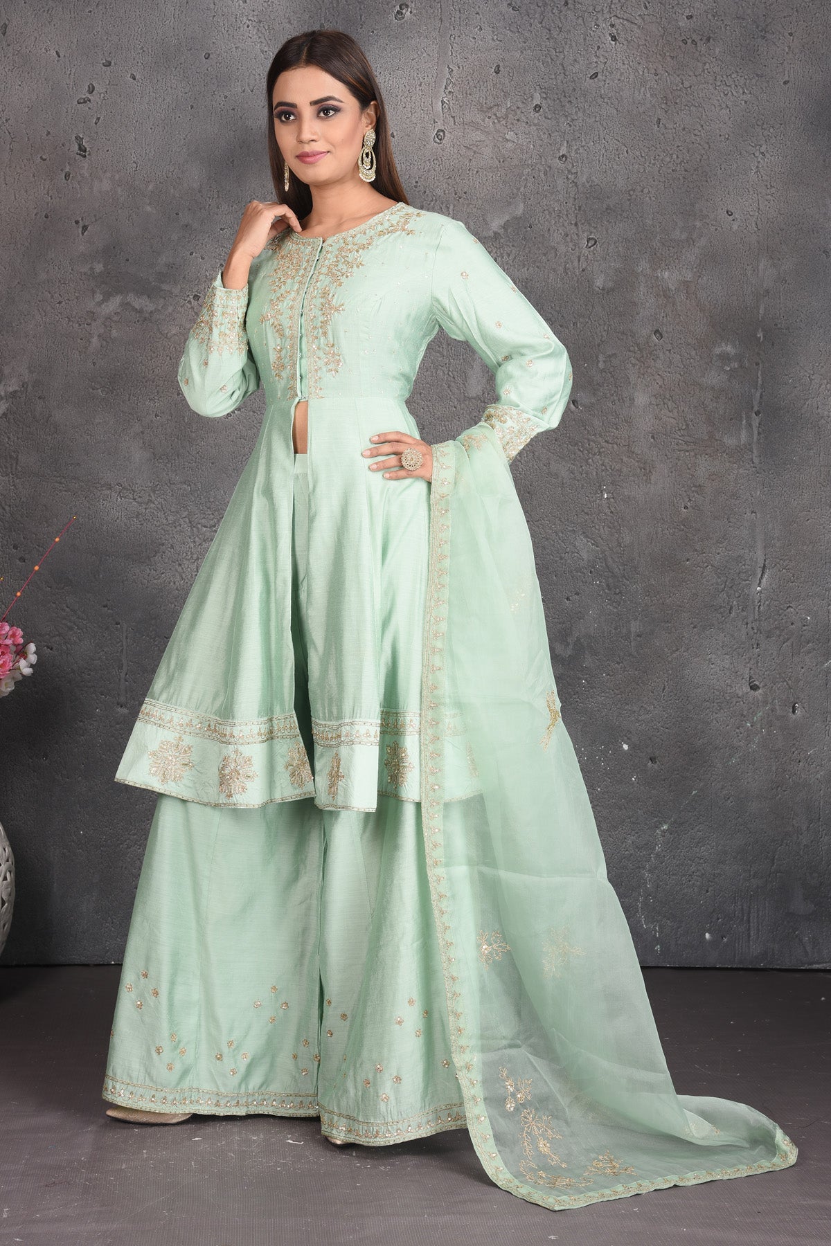 Shop beautiful mint green embroidered designer sharara suit online in USA. Set a fashion statement at parties in designer dresses, Anarkali suits, designer lehengas, gowns, Indowestern dresses from Pure Elegance Indian fashion store in USA.-side