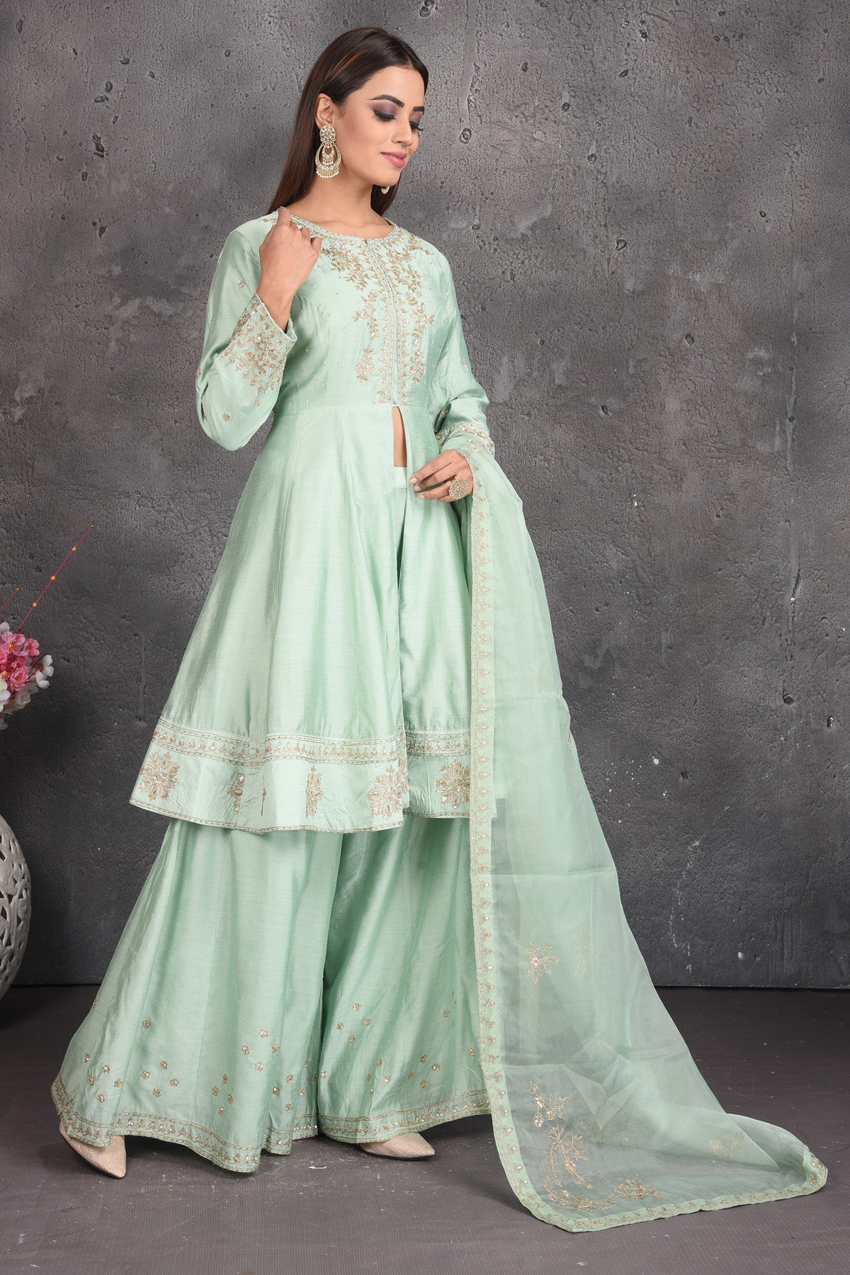Shop beautiful mint green embroidered designer sharara suit online in USA. Set a fashion statement at parties in designer dresses, Anarkali suits, designer lehengas, gowns, Indowestern dresses from Pure Elegance Indian fashion store in USA.-right