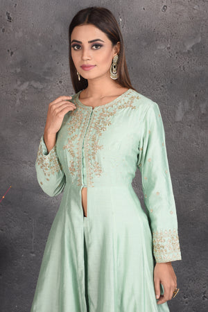 Shop beautiful mint green embroidered designer sharara suit online in USA. Set a fashion statement at parties in designer dresses, Anarkali suits, designer lehengas, gowns, Indowestern dresses from Pure Elegance Indian fashion store in USA.-closeup
