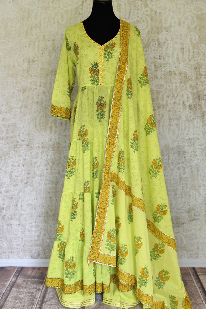 Buy pista green Kalamkari print and gota lace anarkali suit online in USA, Be a vision of style and elegance on festive occasions in designer suits, desinger lehenga, sharara suits, Anarkali suit, designer gowns from Pure Elegance Indian fashion store in USA.-full view