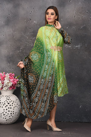 Shop stunning ombre green bandhani draped dress online in USA. Be party ready with exclusive designer wear outfits. Indian designer suits, Anarkali dresses, palazzo suits, sharara suits from Pure Elegance Indian fashion store in USA.-side
