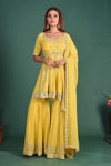 Buy beautiful yellow embroidered peplum sharara suit online in USA with dupatta. Dazzle on weddings and special occasions with exquisite Indian designer dresses, sharara suits, designer lehengas Anarkali suits, wedding lehengas from Pure Elegance Indian fashion store in USA.-full view
