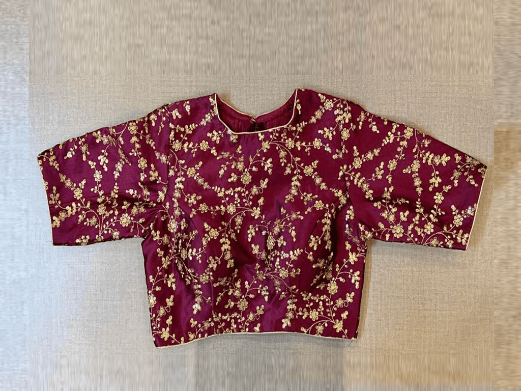 Buy beautiful plum shade embroidered designer saree blouse online in USA. Elevate your saree style with exquisite readymade saree blouses, embroidered saree blouses, Banarasi saree blouse, designer saree blouse, choli-cut blouses, corset blouses from Pure Elegance Indian clothing store in USA.-full view