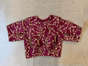 Buy beautiful plum shade embroidered designer saree blouse online in USA. Elevate your saree style with exquisite readymade saree blouses, embroidered saree blouses, Banarasi saree blouse, designer saree blouse, choli-cut blouses, corset blouses from Pure Elegance Indian clothing store in USA.-full view
