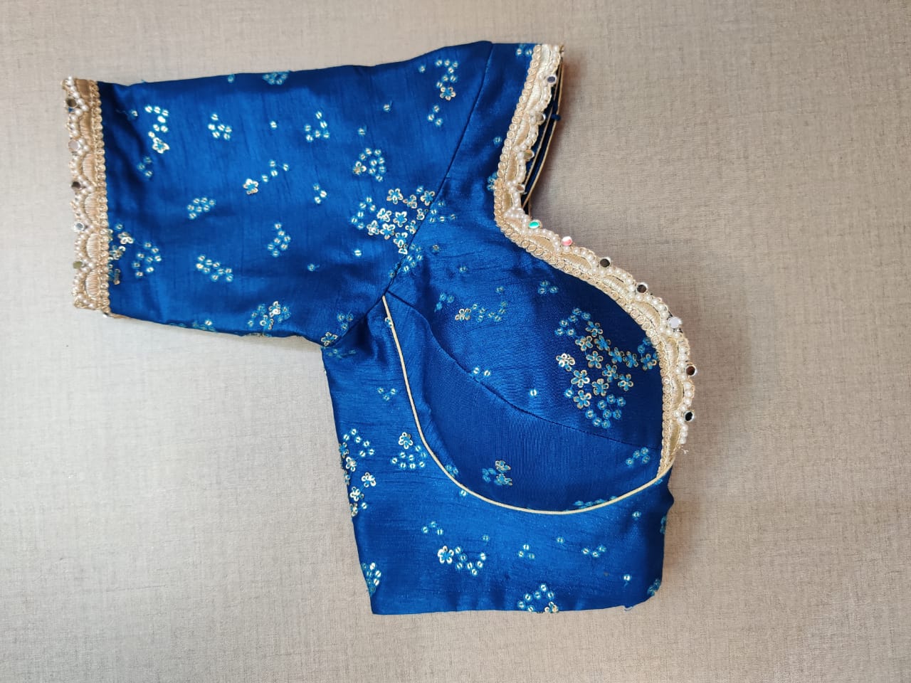Buy stunning royal blue embroidered designer saree blouse online in USA. Elevate your Indian ethnic saree looks with beautiful readymade sari blouse, embroidered saree blouses, Banarasi saree blouse, designer saree blouses, sleeveless saree blouses from Pure Elegance Indian fashion store in USA.-sleeves